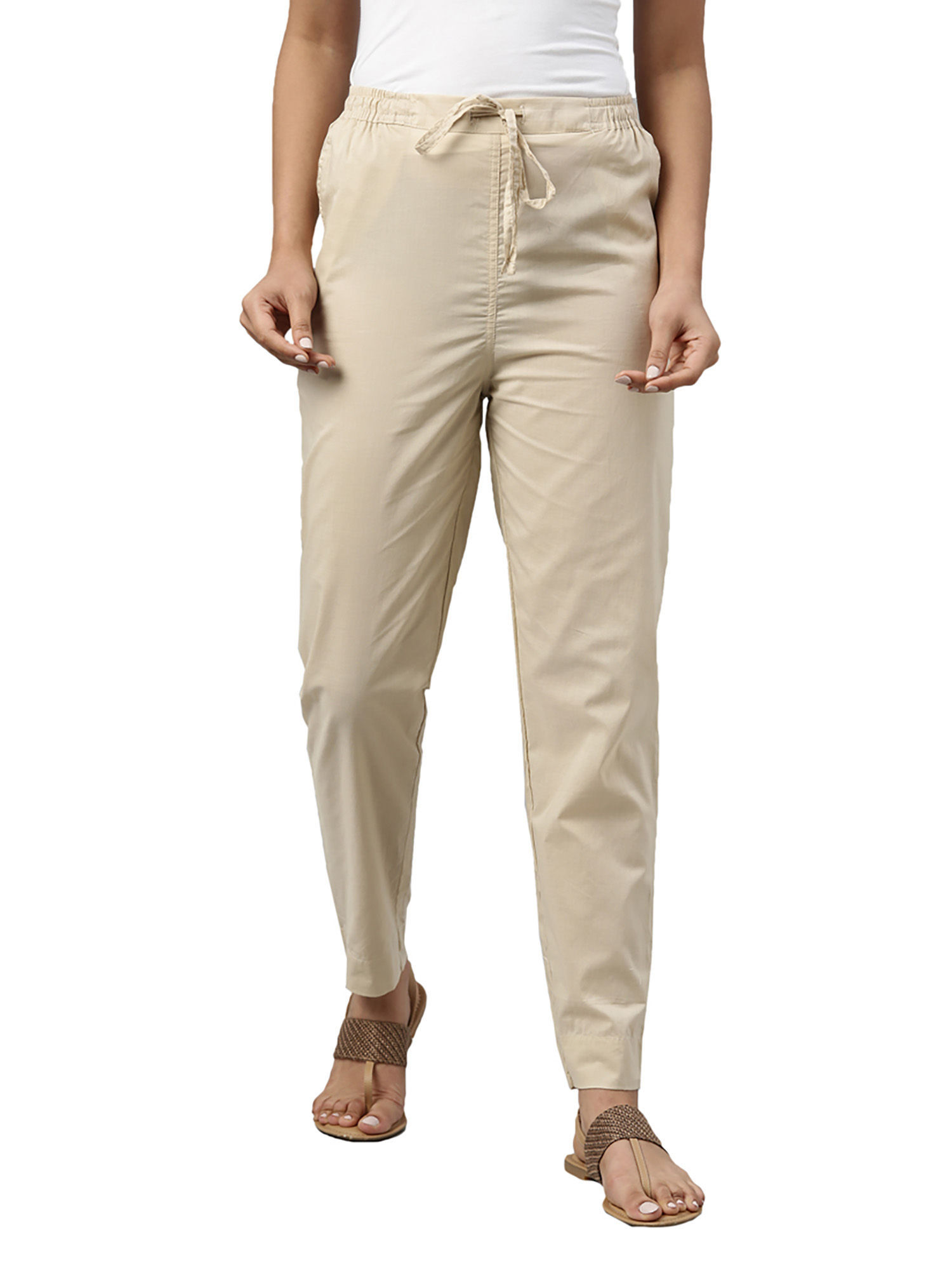 Buy Go Colors Women Medium Beige Solid Mid Rise Metallic Pants online